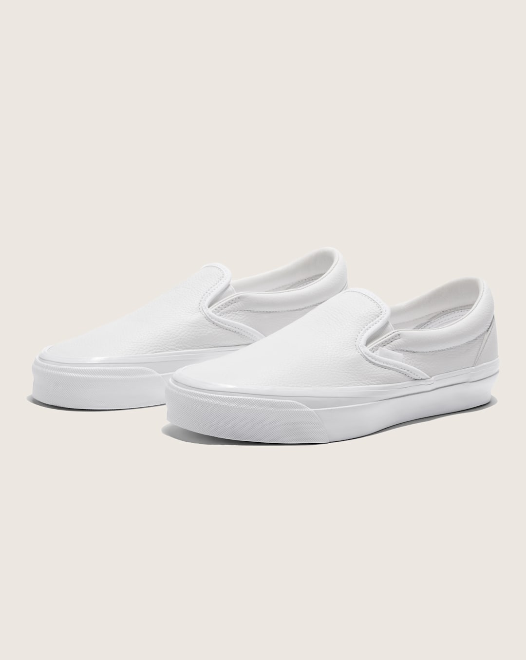 Premium Classic Slip-On Shoe in White | Vans discount