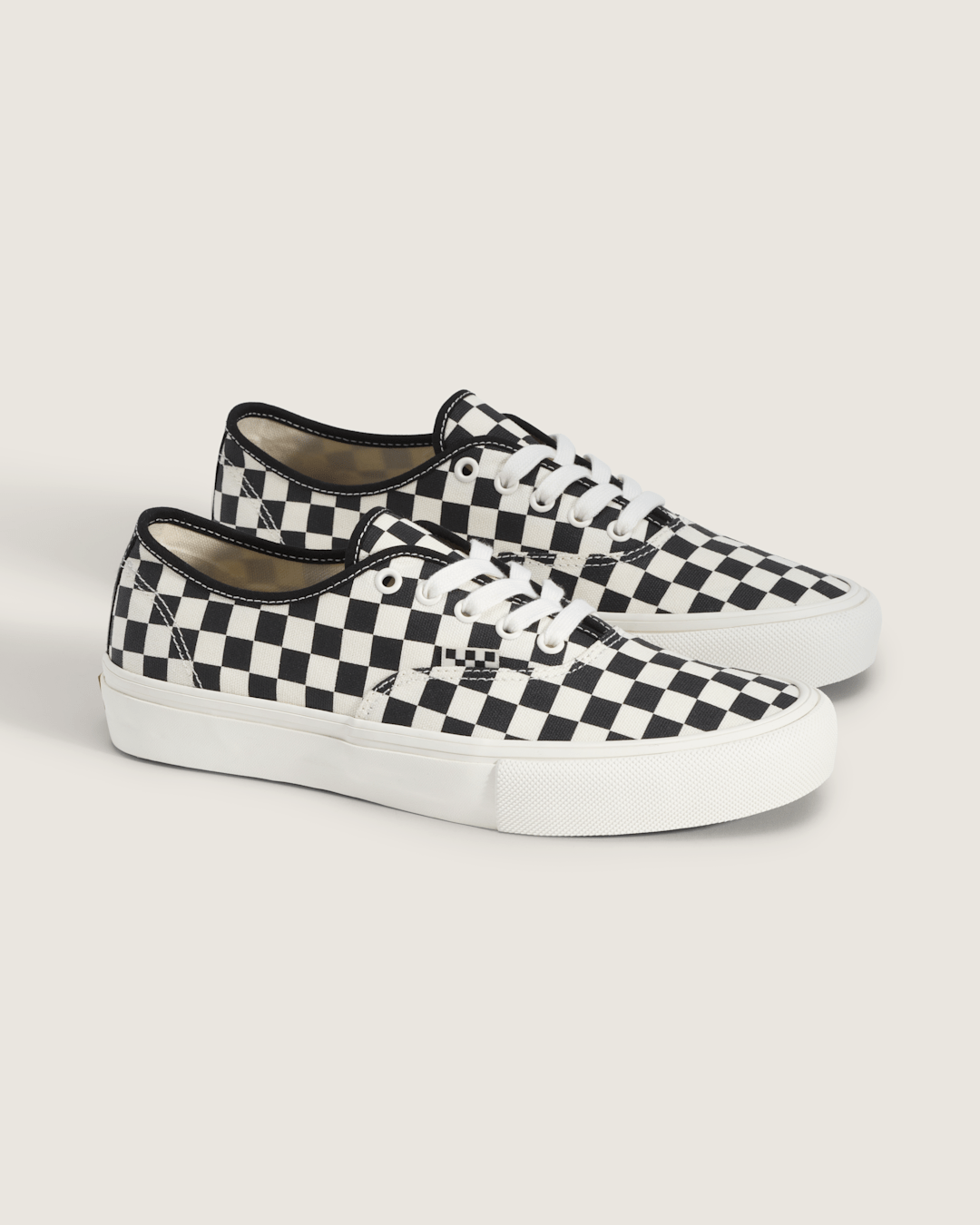 Skate Authentic Checkerboard Shoe in Black / Marshmallow White | Vans online