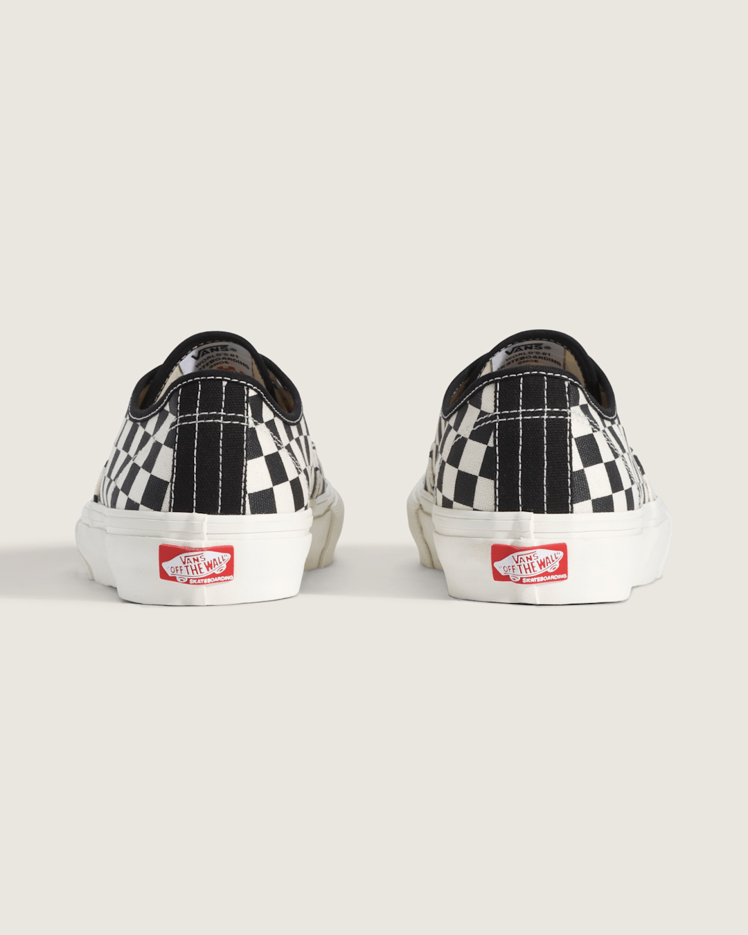 Skate Authentic Checkerboard Shoe in Black / Marshmallow White | Vans online