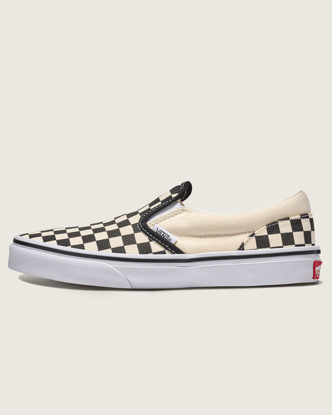 Big Kids Classic Slip-On Shoe in Checkerboard Black / White | Vans sale