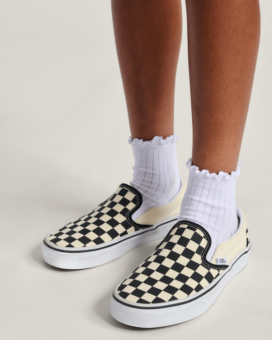 Big Kids Classic Slip-On Shoe in Checkerboard Black / White | Vans sale